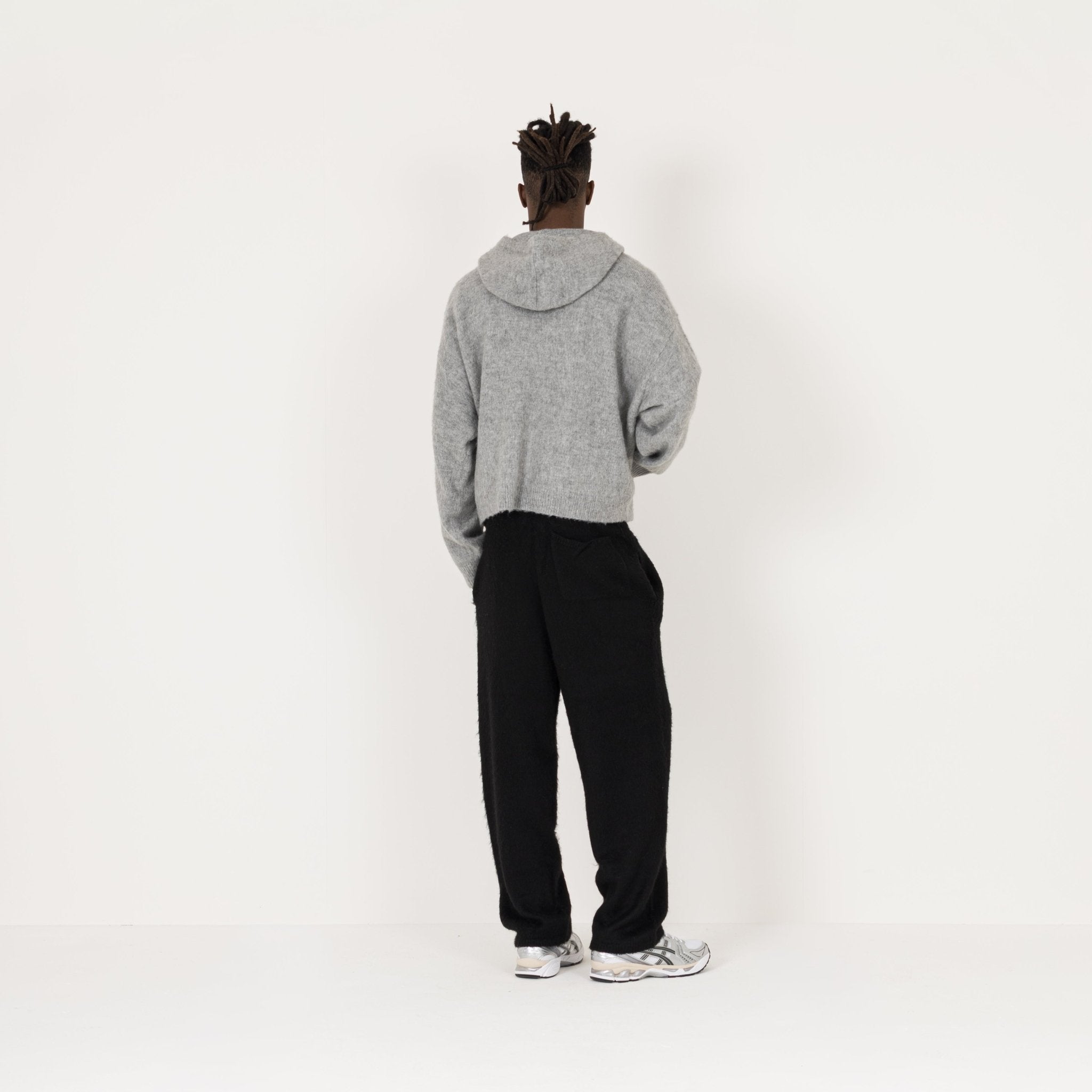 Model Back view of Destructive Mohair Black Sweatpants
